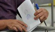 Erhürman onayladı: Karma oy sistemini kaldıran yasa Resmi Gazete’de